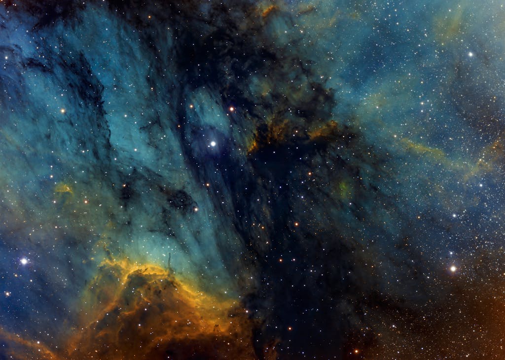 A mesmerizing view of a nebula amidst starry skies, showcasing the beauty of the universe.